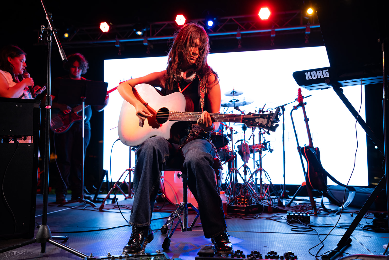Guitarist performing on stage at a previous Summer Music Festival